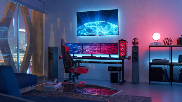 Gamer Room Interior of a gamer room lit with neon lights. domestic room stock pictures, royalty-free photos & images