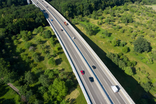 istock Traffic on Highway Bridge, Aerial View 1311351031