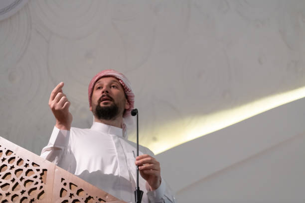 istock Muslims young arabic Imam has a speech on friday afternoon prayer in mosque. 1311351752