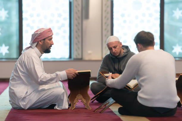 istock muslim people in mosque reading quran together 1311354229