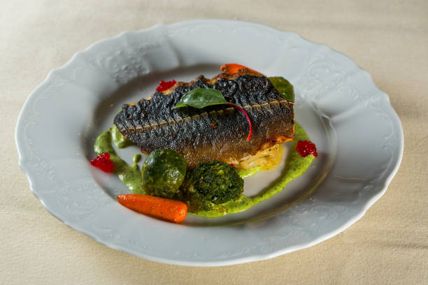 istock fish fillet with vegetables 1311354422
