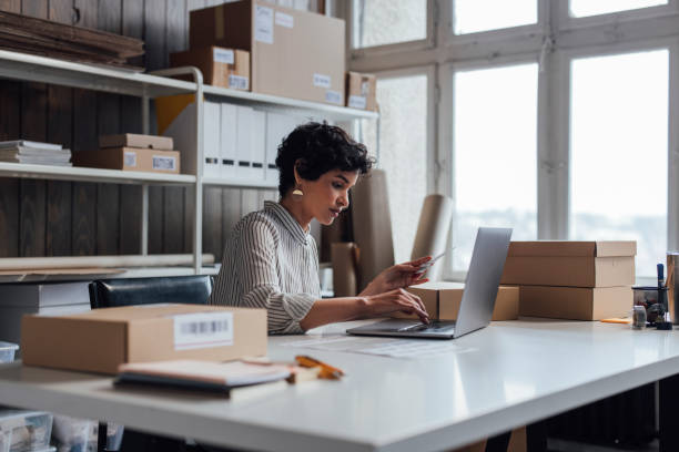 Beautiful Online Store Owner Working on Her Laptop