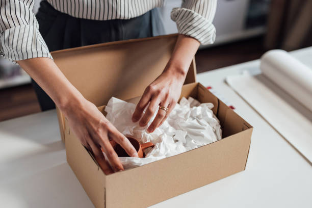 Anonymous Small Business Owner Packing Her Products for Delivery