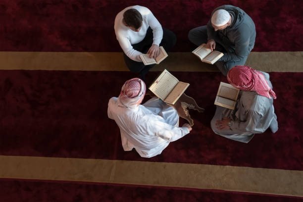 istock muslim people in mosque reading quran together 1311356005