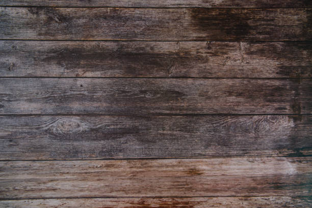 istock Dark wood texture. Background dark old wooden panels. 1311356814