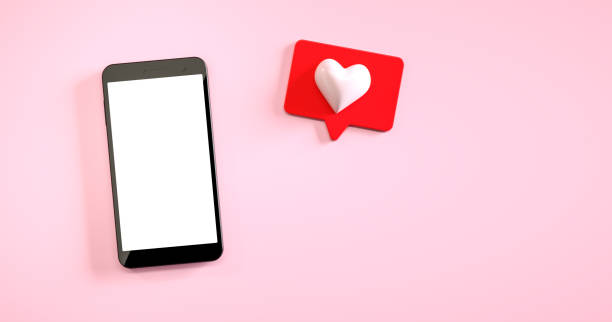 istock Mobile phone mockup with a like notification at pink background. 3d rendering 1311356916