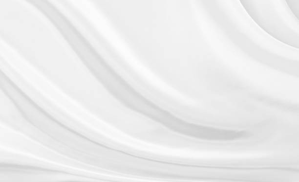 istock White gray satin texture that is white silver fabric silk background with beautiful soft blur pattern natural. 1311366110