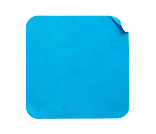 istock Blank blue square adhesive paper sticker label isolated on white background 1311367134