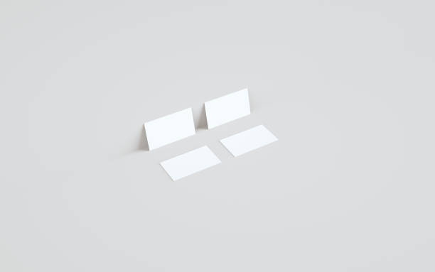 istock Business Card Mock-Up (3.5 x 2) Mock-Up - Two Cards Against Wall Background 1311367376