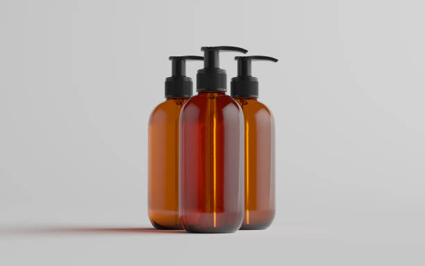 istock Amber Glass Pump Bottle Mock-Up - Liquid Soap, Shampoo Dispenser - Three Bottles 1311367428
