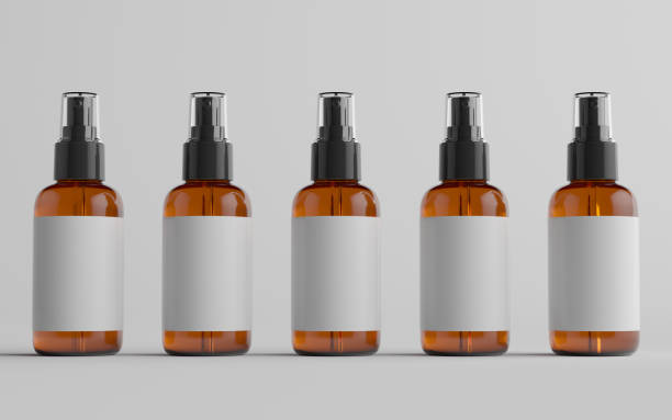 istock Amber Spray Bottle Mockup - Multiple Bottles. Blank Label 1311367446