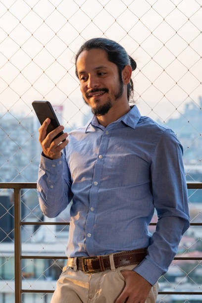 istock Young businessman using a smartphone 1311369564