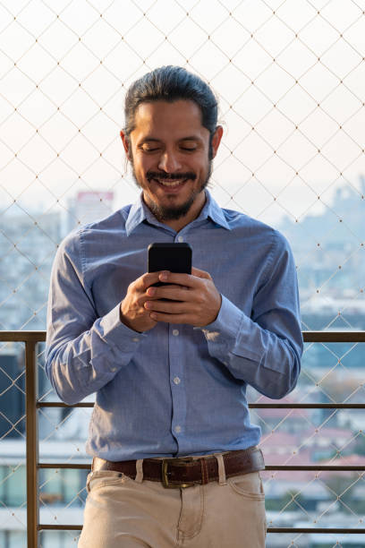istock Young businessman using a smartphone 1311369576
