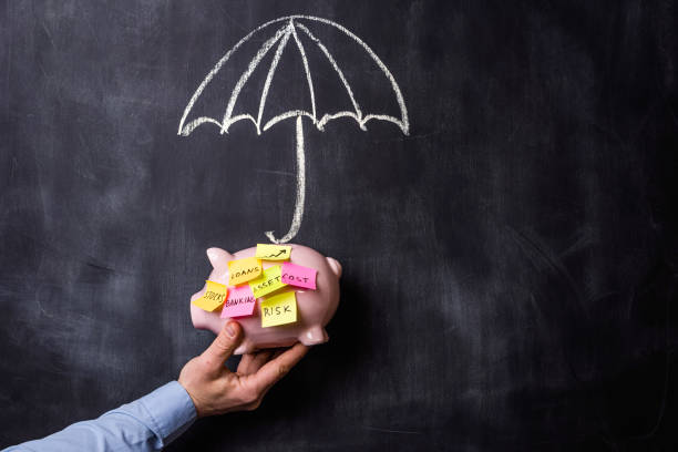 assurance financière - umbrella protection savings currency photos et images de collection