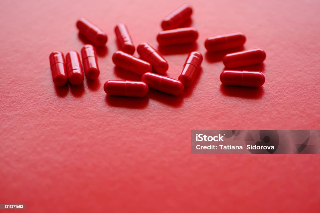 Sepositories Tablet Red Red Capsules Spilled On A Red Background Stock Photo - Download Image ...