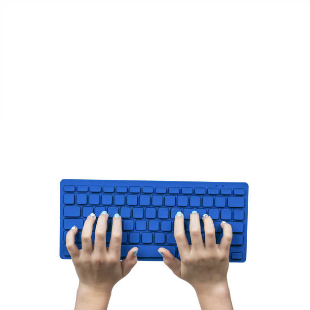 istock Female hands with a small blue keyboard isolated on a white background. 1311373792