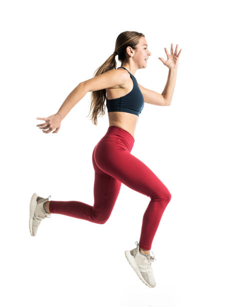 istock Young girl running on white background 1311380620