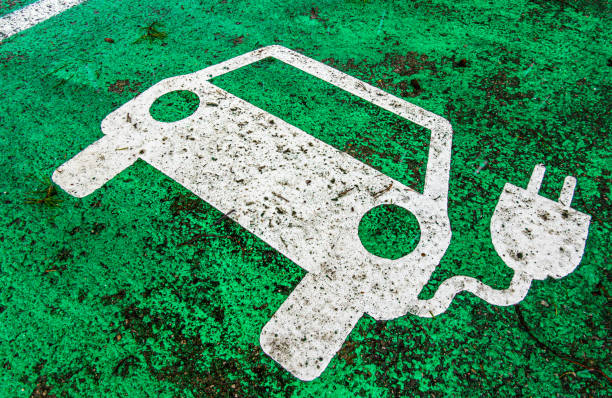 istock road marking at a electric car charging station 1311390294