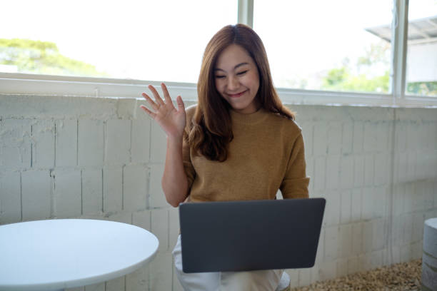 istock A beautiful young asian woman using laptop computer for video call 1311391819