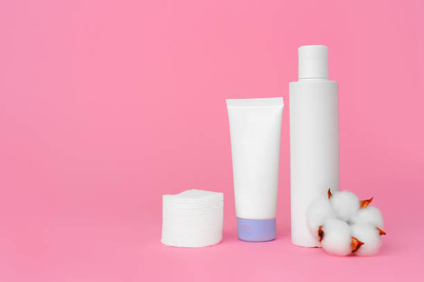 istock Stack of cotton discs and skicare cosmetic bottle 1311393802
