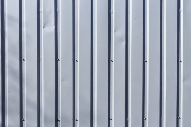 istock Vertical corrugated metal sheet wallcan used for backgrond 1311394074