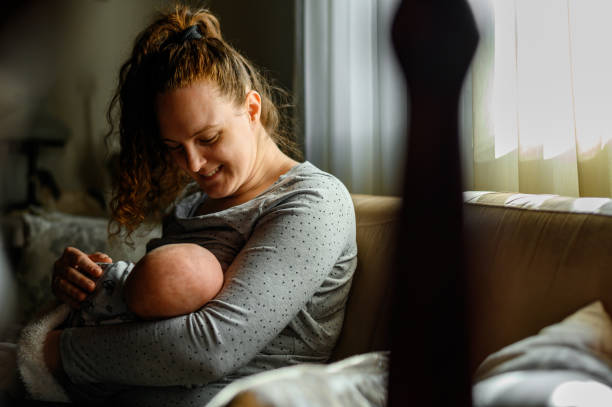istock Mother breastfeeding her baby boy 1311395983