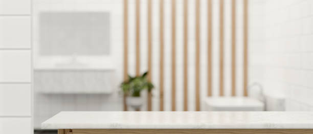 istock 3D rendering, empty marble counter in bathroom, copy space on marble desk in blurred bathroom 1311396234