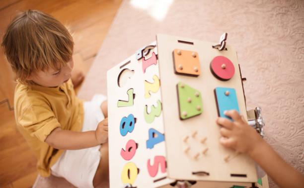 istock Sister and brother playing with interactive game. 1311397651