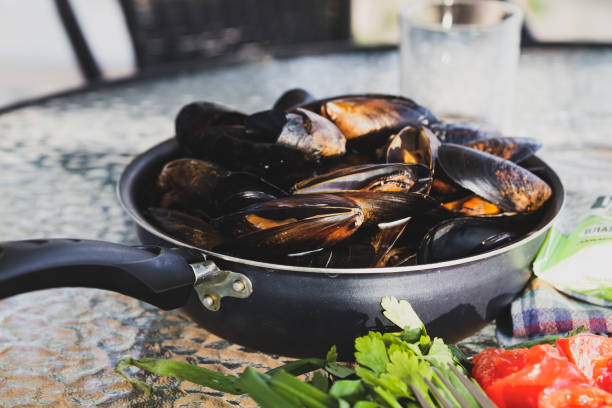 istock Boiled mussels in a pot 1311398781