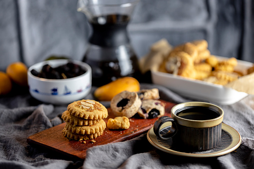 homemade wholegrain cookies, fresh fruits and coffee on table