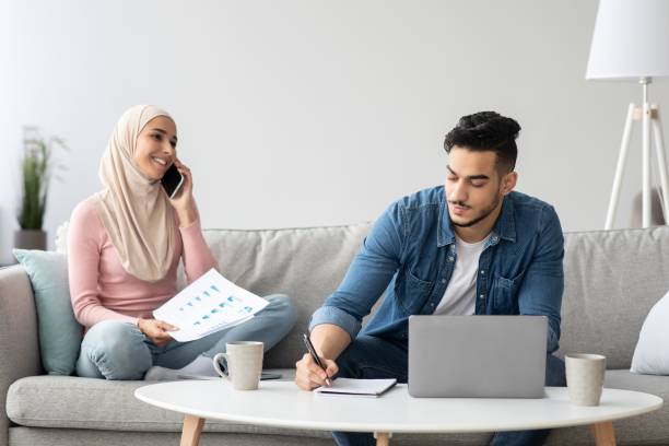 istock Successful middle-eastern family having business from home 1311404885