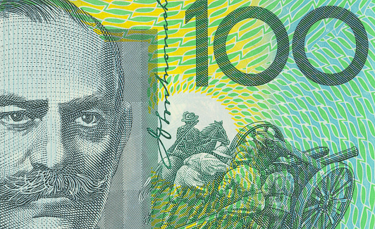 Close up on Australian 100 dollar banknotes.