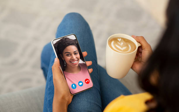 istock Distant Communication. Unrecognizable black lady using smartphone for video call with friend 1311406370