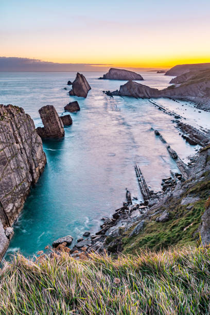 istock Coastal and oceanic shapes at sunset 1311407770