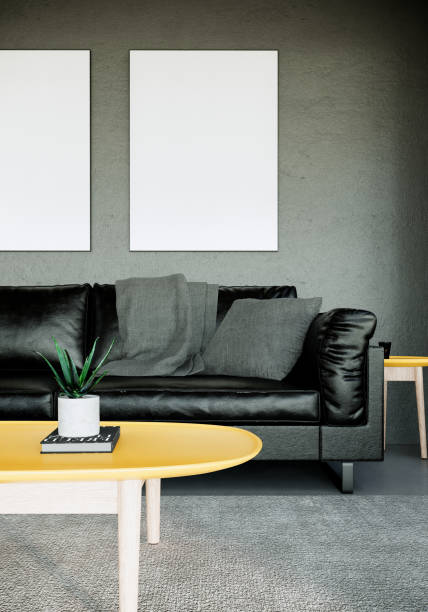 istock modern gray room mock up interior. the room have leather sofa, table and blank picture frame. 3D background illustration 1311407976