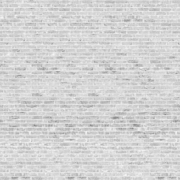 istock Seamless texture White Brick Burnt . Tiling clean for background pattern. Rectangle mosaic tiles wall high resolution. Old or artificially aged in production 1311414688