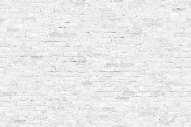 istock Seamless texture White Brick. Tiling clean for background pattern. Rectangle mosaic tiles wall high resolution. Old or artificially aged in production 1311414709