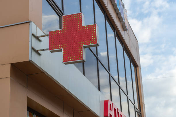 Dzhankoy, Republic of Crimea, December 31, 2020 - Red cross on building. For pharmaceutical and medical topics