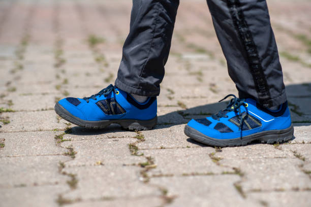 istock little boy with his new shoes 1311419008