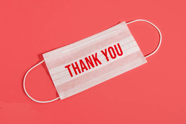 istock White Protective Mask with Thank You Message 1311420452