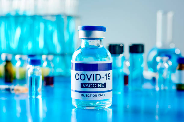 istock simulated covid-19 vaccine vial on a laboratory 1311420458