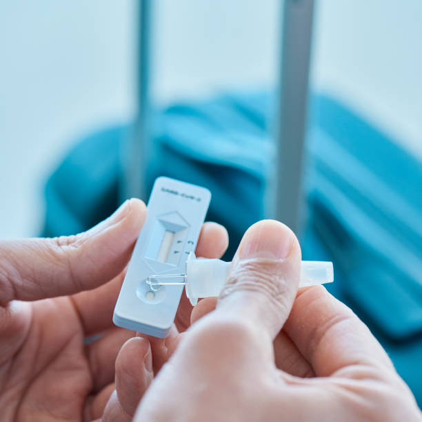 istock man at the airport has a covid-19 rapid test 1311420463