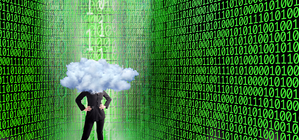 Conceptual technologies image of businesswoman with white cloud over binary code