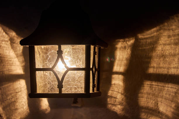 single lantern sconce on the wall of the cafe