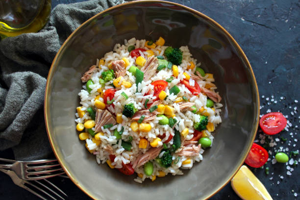 istock Rice salad with vegetables and tuna. 1311423100