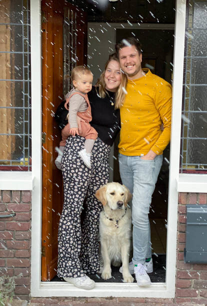 istock Young Dutch Family posing in doorway 1311424084