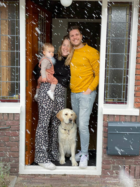 istock Young Dutch Family posing in doorway 1311424087