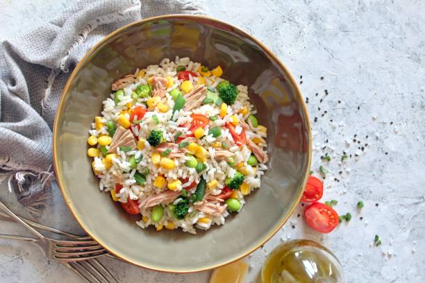 istock Rice salad with vegetables and tuna. 1311424336