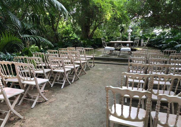 wedding ceremony, row of chairs for guests in a park - formal garden tropical climate park plant imagens e fotografias de stock