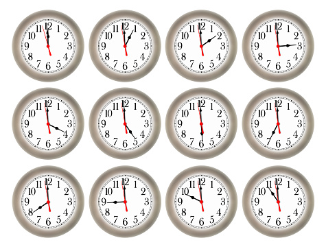 Conceptual time image of clock faces for each hour isolated over black background